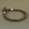 braided brown leather bracelet with pewter beads and loop closure