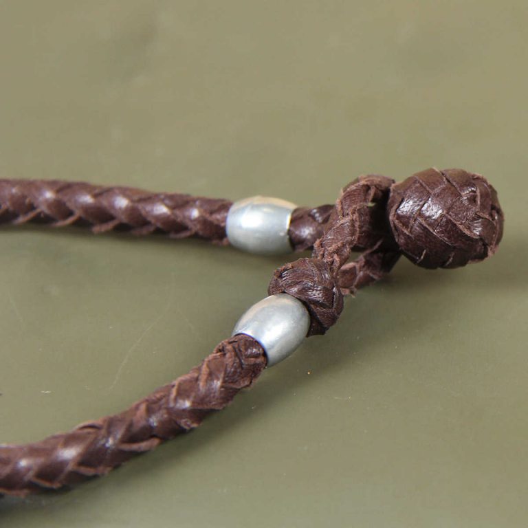 braided brown leather bracelet with pewter beads and loop closure
