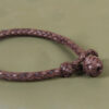 braided brown leather bracelet with and loop closure