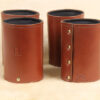 brown leather can caddies with initial personalization stamp and brass rivets
