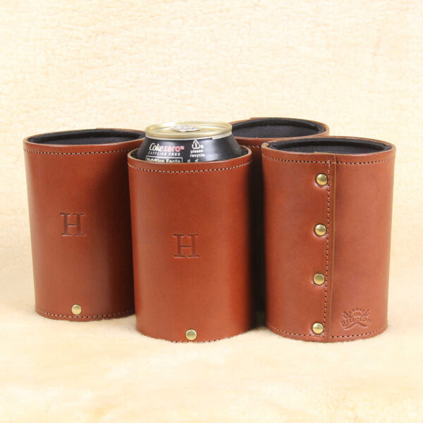 can of coke inside of brown leather can caddies with personalized initial stamp