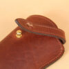 no 2 vintage brown leather eyeglass case with strap and brass post closure