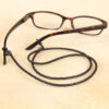 leather eyeglass lanyard in dark brown braided style.