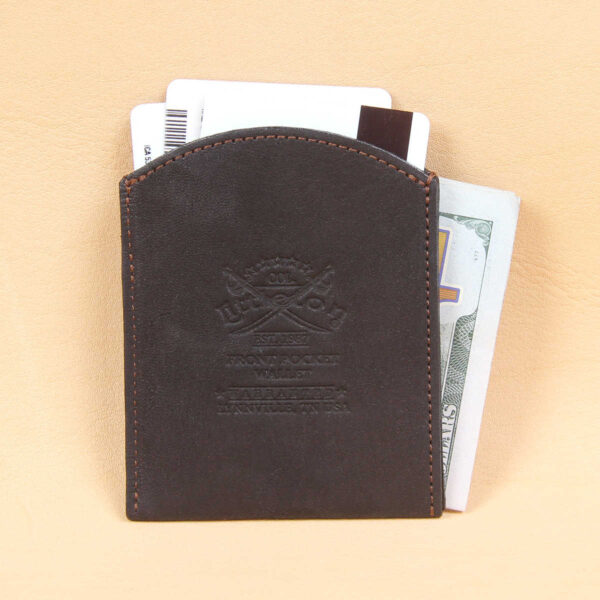 Black leather front pocket wallet back side with Col. Littleton logo embossed in center.