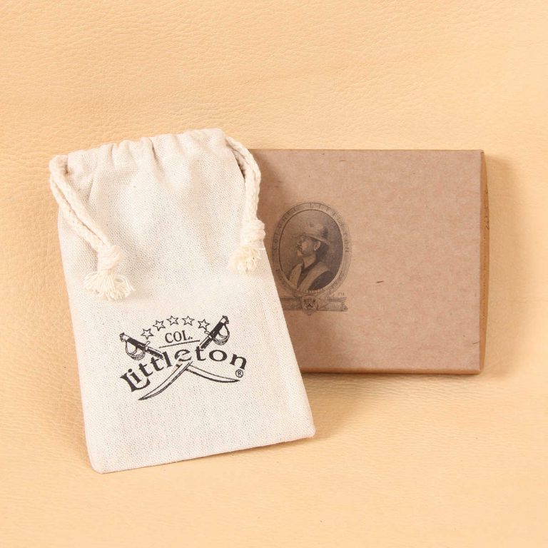 Leather front pocket wallet cream gift bag and brown gift box.