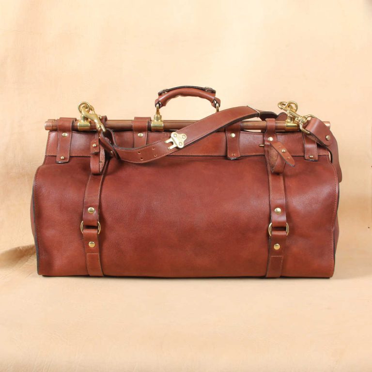 buffalo leather duffel bag on table