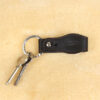 no 6 black key ring with personalization stamp with keys