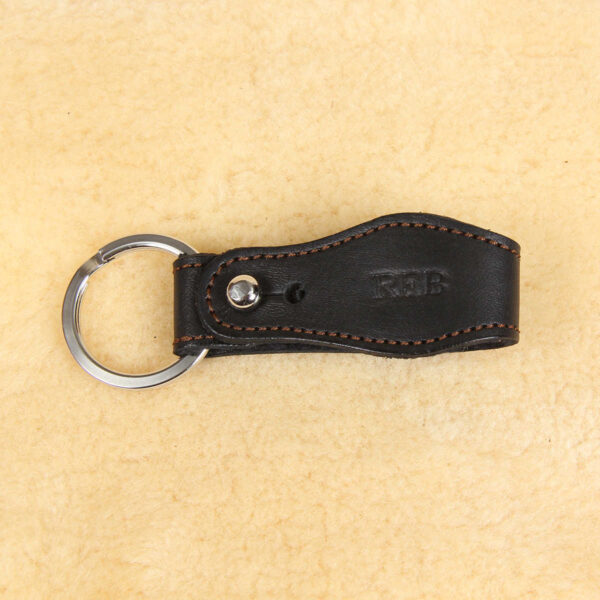 no 6 black key ring with personalization stamp