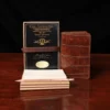 Group view of the no. 27 american alligator pocket journal with the refills, pencil, archive box and notecards included.