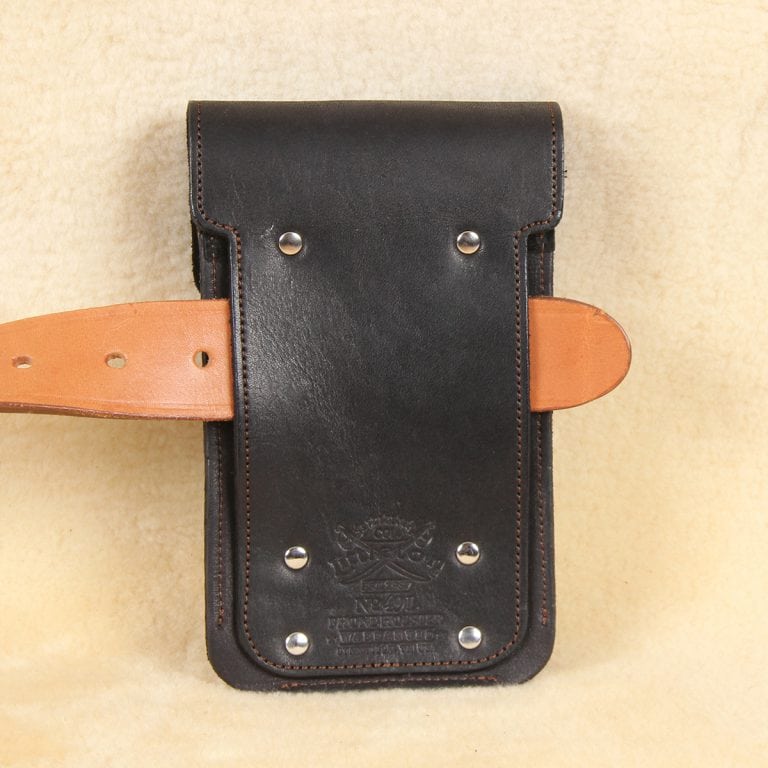 Black leather holster phone case for iPhone XR XS with tan belt sliding through belt slot