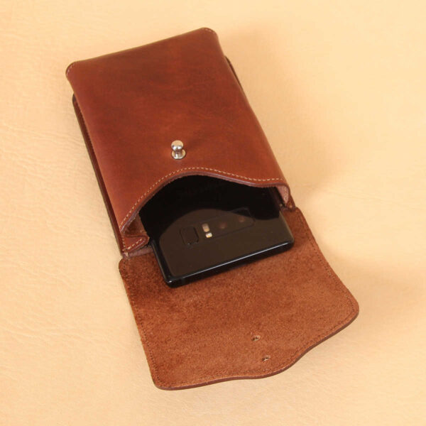 Brown leather holster phone case for iPhone XR XS open with galazy phone inside