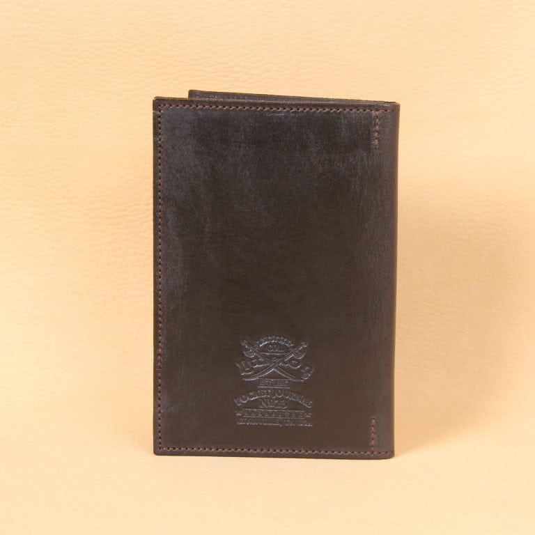 Pocket journal black leather back embossed with Col. Littleton logo.