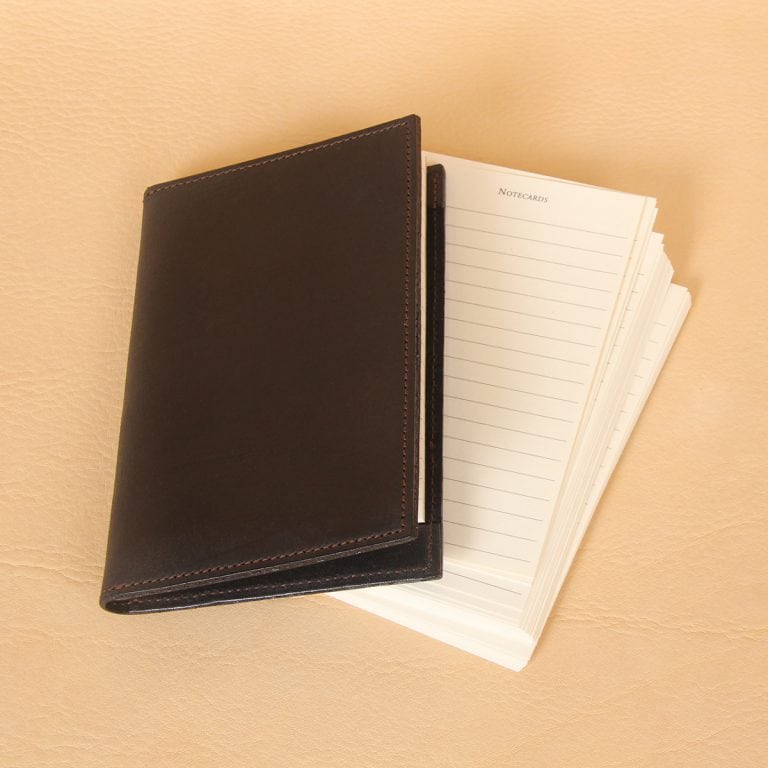 Pocket journal black leather front closed with ruled notecards.