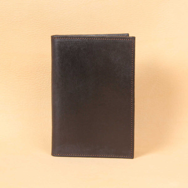 Pocket journal black leather front closed.
