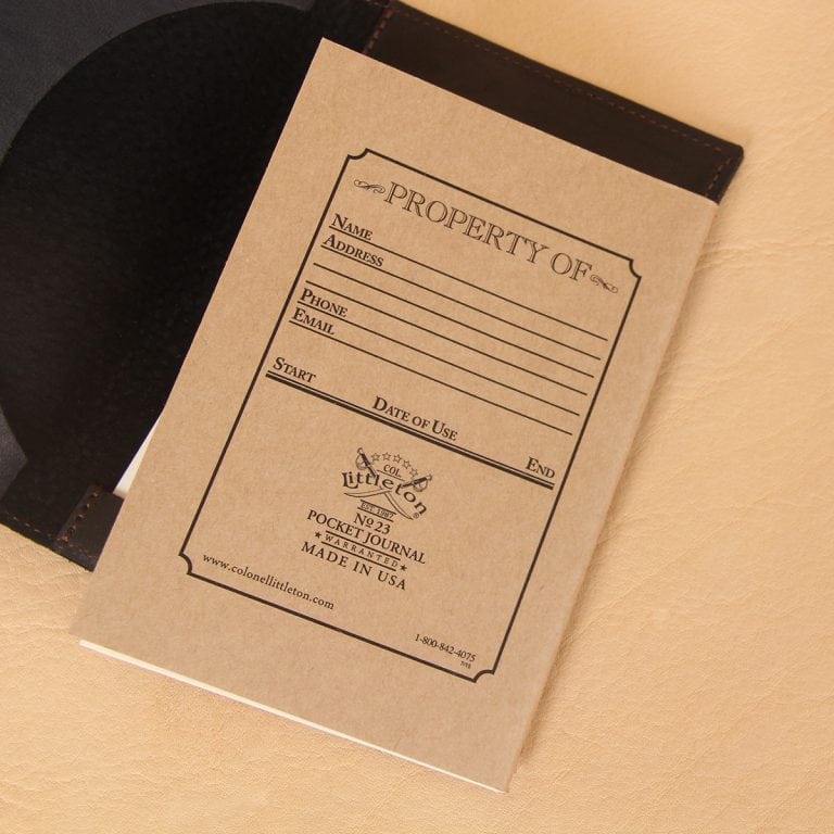 Pocket journal black leather register notebook back.
