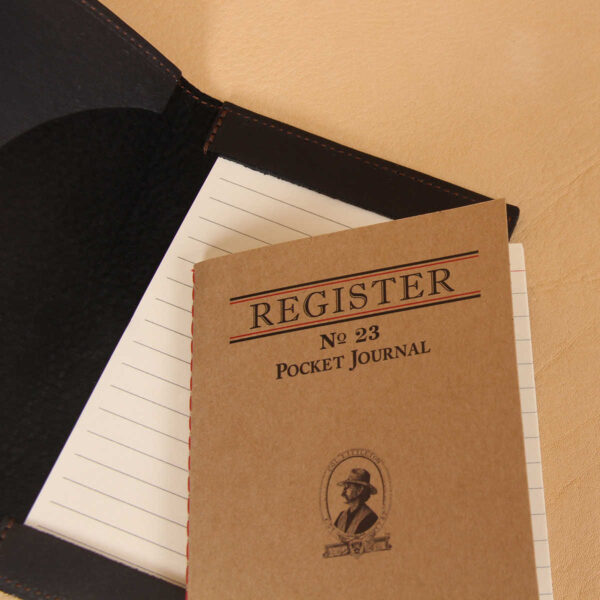 Pocket journal black leather register notebook brown cover.