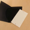 Pocket journal black leather notecard pocket and ruled notecards.
