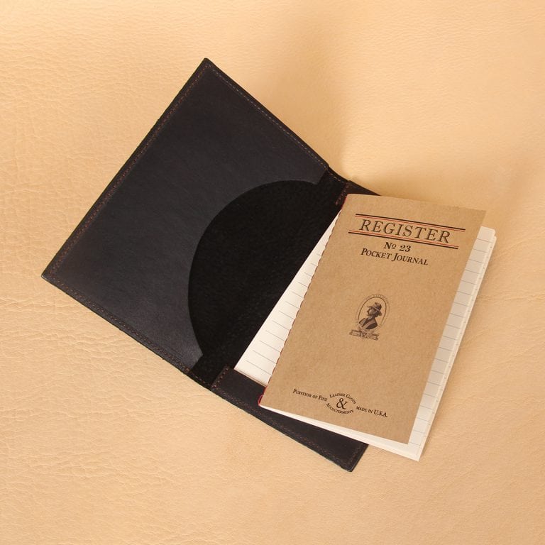 Pocket journal black leather open register notebook cover.