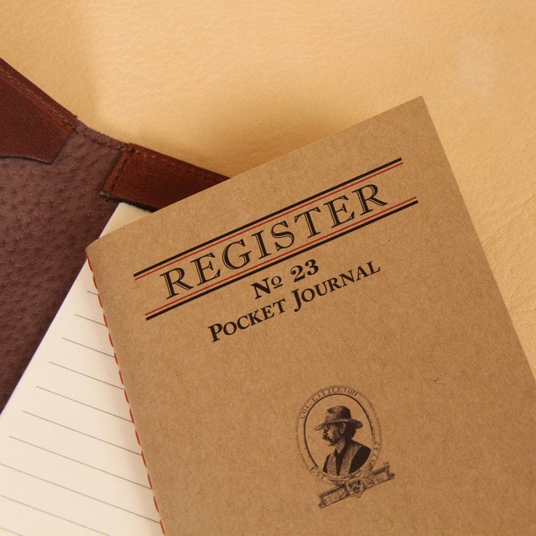 Pocket journal brown leather register notebook cover.