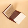 Pocket journal brown leather open ruled notecards and pocket.