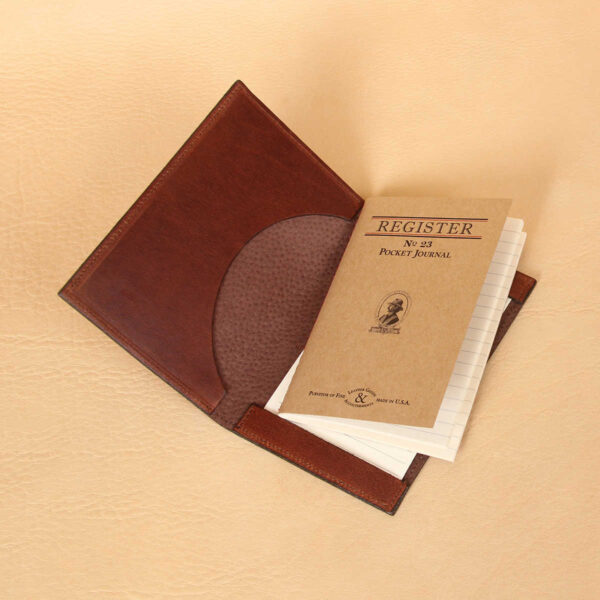 Pocket Journal brown leather open brown pigskin lining and brown register notebook.