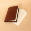 Pocket Journal brown leather front closed with cream, ruled notecards.