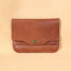 no11 vintage brown leather composition pocket with personalized plate on the front