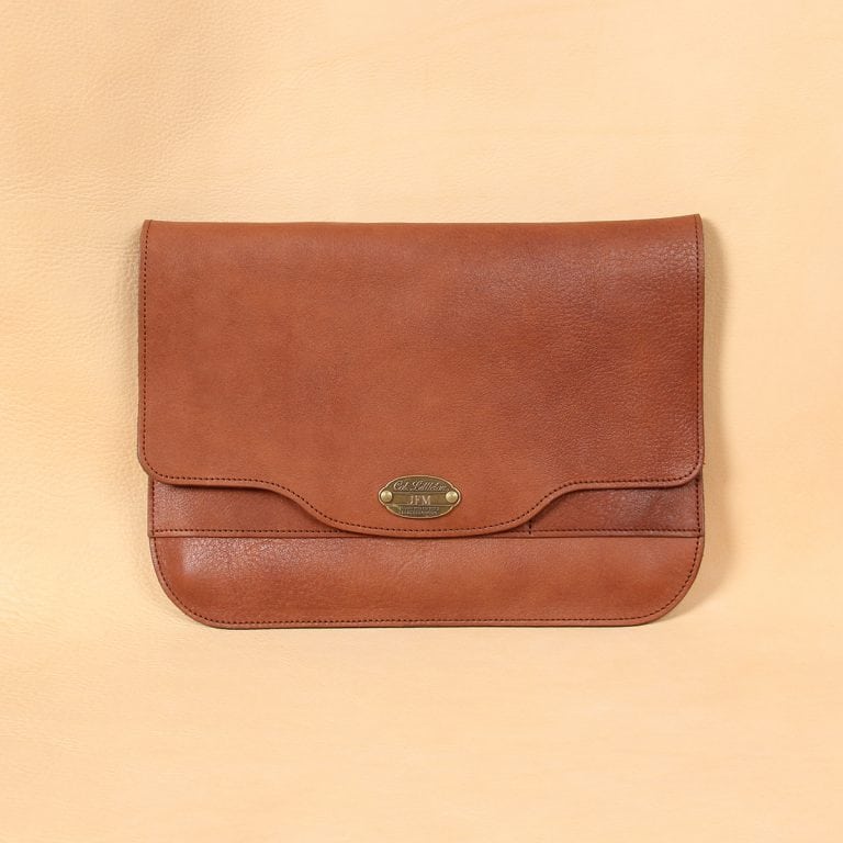 no11 vintage brown leather composition pocket with personalized plate on the front