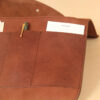 no11 vintage brown leather composition pocket with accessories inside of opening