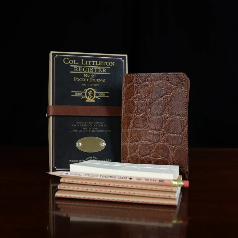 No. 27 Pocket Journal in Vintage Brown American Alligator - ID 001 - front view, shown with journal register archive box, 2 journal register notebooks, a stack of cream index notecards, and a Col. Littleton wooden No. 2 pencil