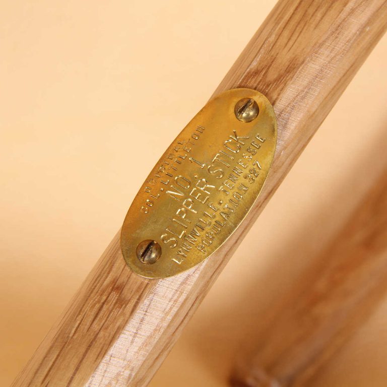 no 1 slipper stick with personalized brass plate