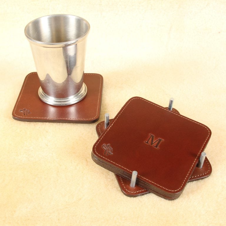 brown square leather coaster set in holder with letter personalization stamp