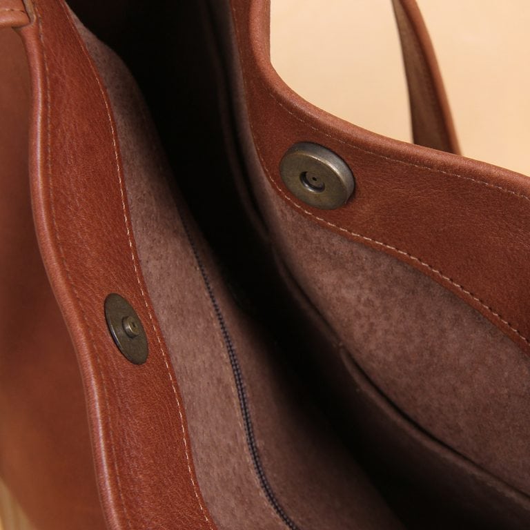 brown leather tote bag snap closure