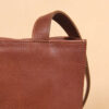 brown leather tote bag with strap