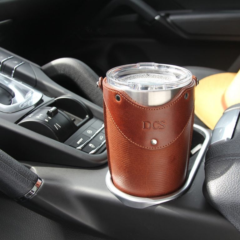 Leather tumbler sleeve for 20 ounce Yeti Rambler cup in Porsche car cup holder.