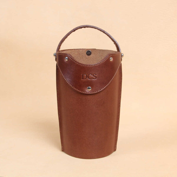 Leather tumbler sleeve for 20 ounce Yeti Rambler cup brown sleeve only front.