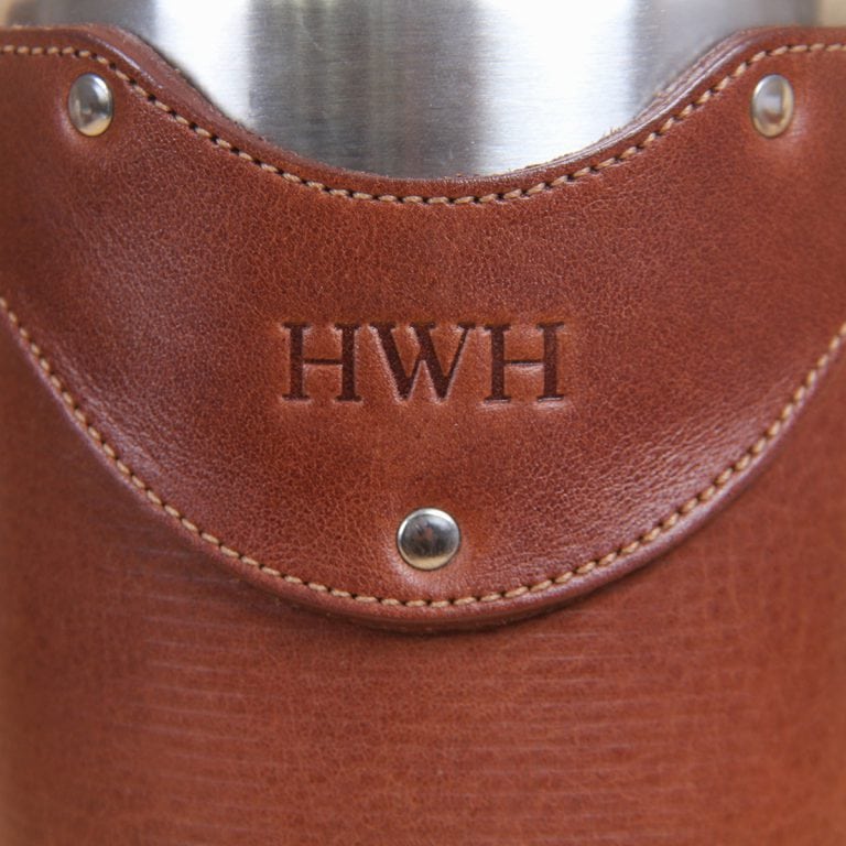 Leather tumbler sleeve for 30 ounce Yeti Rambler cup 3 initials embossed on sleeve front.