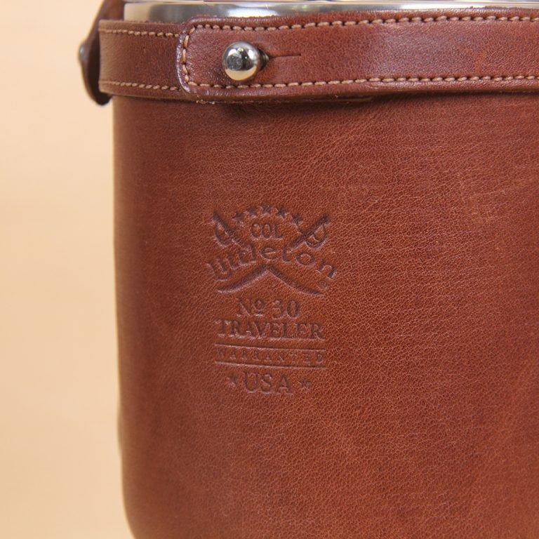 Leather tumbler sleeve for 30 ounce Yeti Rambler cup back leather embossed logo.