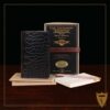 No. 27 Pocket Journal in Black American Alligator - ID 001 - front view, shown with journal register archive box, 2 journal register notebooks, a stack of cream index notecards, and a Col. Littleton wooden No. 2 pencil