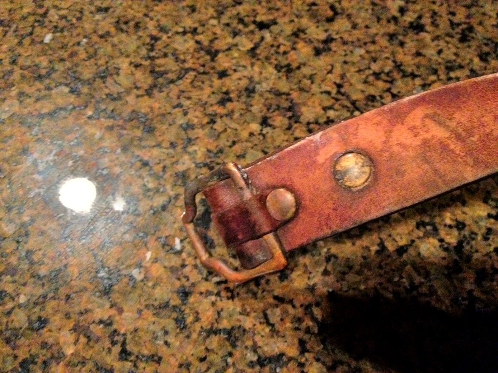 Worn, water-damaged No. 5 Cinch Belt, cleaned up, buckle