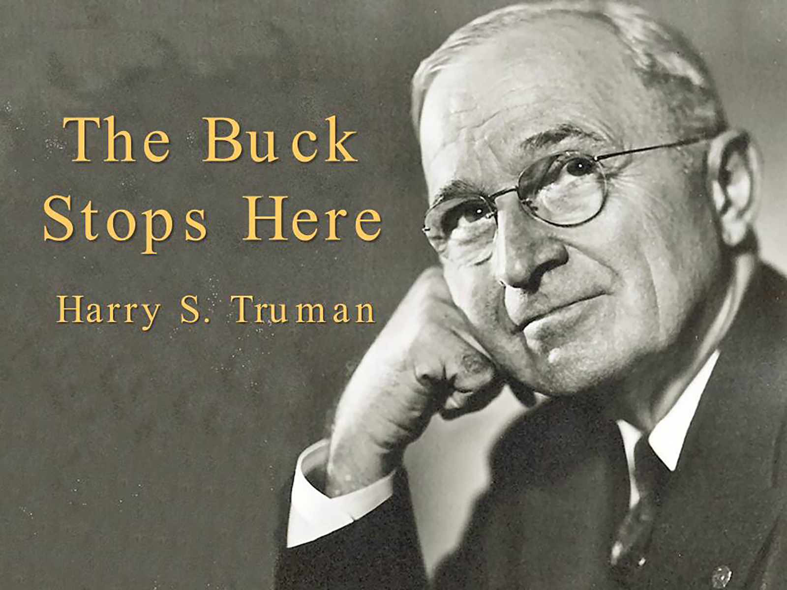 Black and white headshot of President Harry Truman with the text The Buck Stops Here