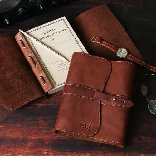 no9 brown american leather journal with notepad on wood desk