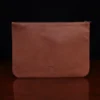 no3 brown leather large zip it bag - back view - on wooden table