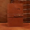 front view of the colonel littleton private stock journal with a rugged leather