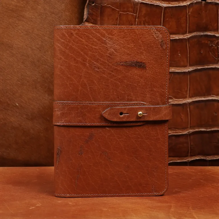 front view of the colonel littleton private stock journal with a rugged leather