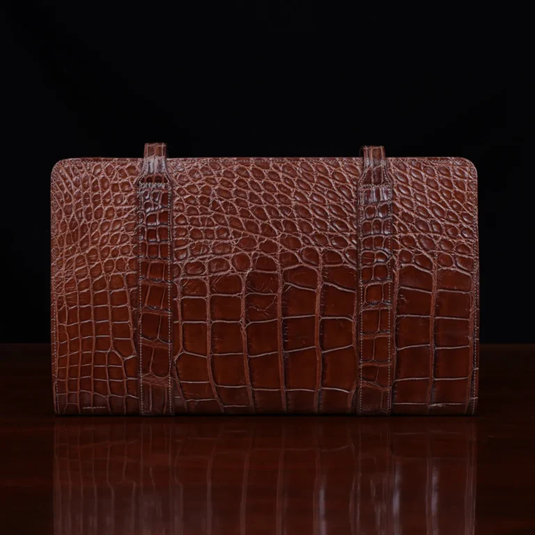 No.18 legal portfolio in alligator back horizontal view - id 001- on wooden table with black background