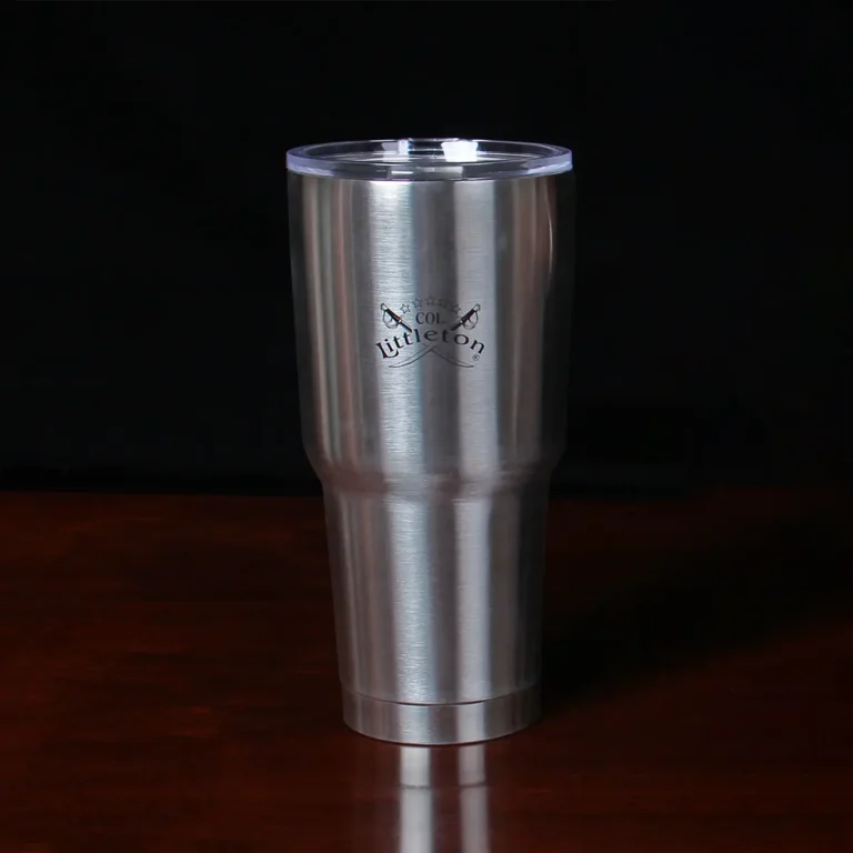 the included stainless steel cup with the colonel littleton logo