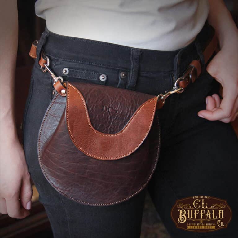 Bitsy Belt Bag in dark Tobacco Brown American Buffalo - woman in black jeans and white shirt wearing the purse around her waist