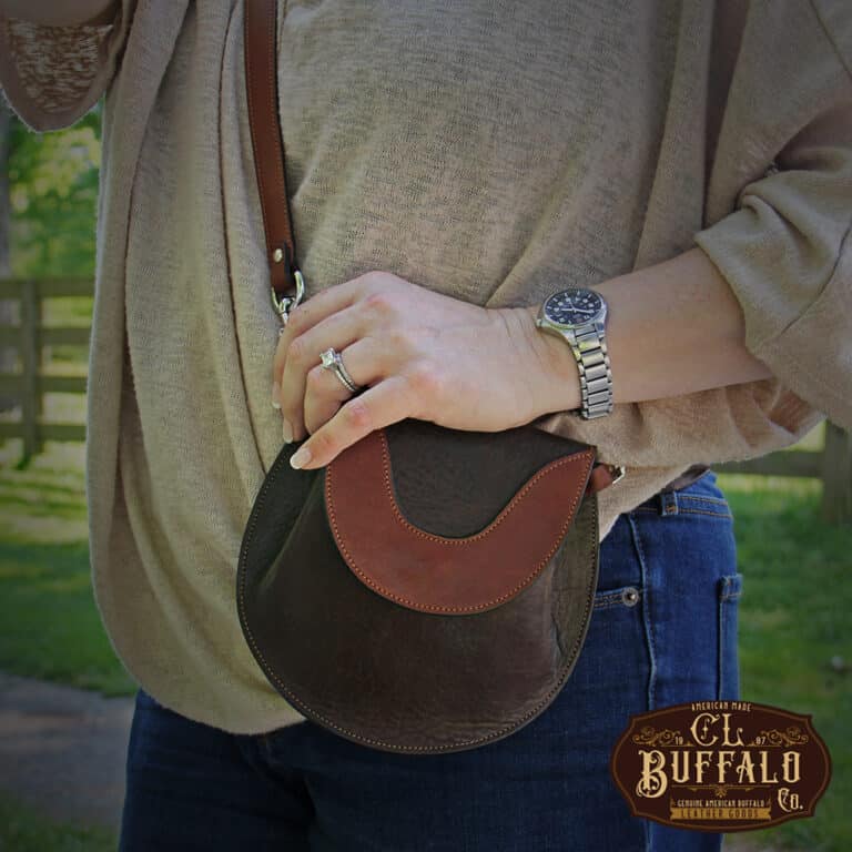Bitsy Belt Bag in dark Tobacco Brown American Buffalo - woman in tan shirt and jeans wearing the purse crossbody