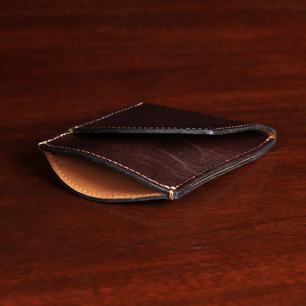 front pocket wallet in tobacco buffalo showing the side